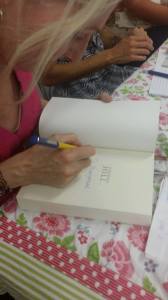 ANNA SIGNING BOOKS